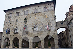 Front view of Palazzo del Comune. City Hall. Municipal Museum of Pistoia. Tuscany. Italy.