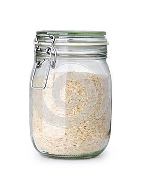 Front view of parboiled rice glass in jar