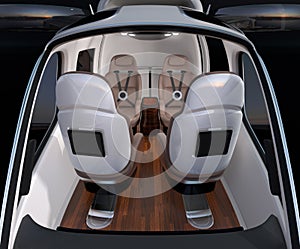 Front view of Passenger Drone interior. Front leather seats turned backward photo