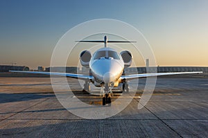 A front on view of a private jet photo