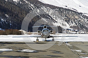 Front view of a private jet in the airport of St Moritz Switzerland in winter