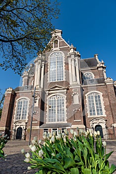 Front view of protestant Westerkerk church in downtown of Amsterdam, Netherlands