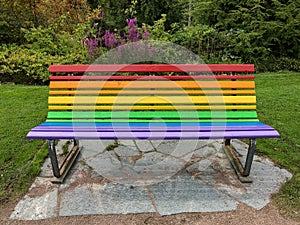 Front View of Rainbow Park Bench on Stone Foundation