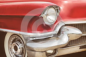 Front view of a red fifties American car