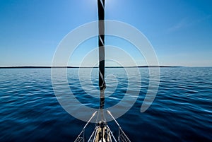 Front view of sailing boat on the sea.