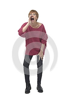 front view of a screaming woman with open mouth and raised arms looking at camera