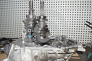 Front view of the shafts and main gear of a partially disassembled manual transmission