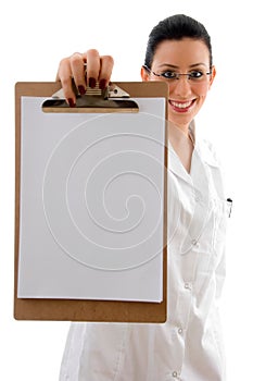 Front view of smiling doctor showing writing pad