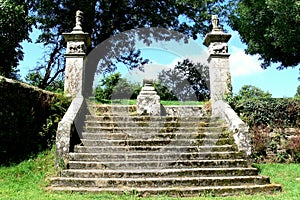 Stone staircase leading to the fountains of the chapel Saint Nicodemus in the village of PlumÃÂ©liau photo