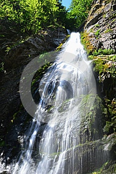 Front view of Sutov waterfall, one of the tallest waterfalls in Slovakia, during summer season.