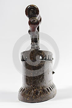 Front view of traditional coal iron on white photo