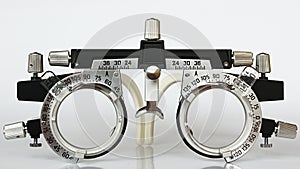 Front view of trial frame used in ophtalmology and optometry to diagnose and correct refractive errors.