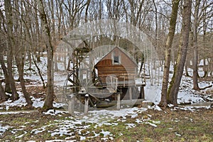 Front view of vertical wheel water mill in the ASTRA Sibiu museum, Romania.