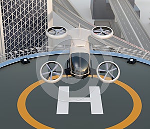 Front view of white self-driving passenger drone takeoff and landing on the helipad