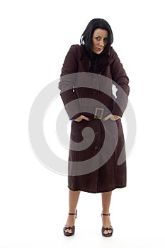 Front view of woman wearing overcoat