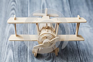 Front view of wooden toy airplane