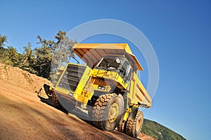 Front view of yellow tipper truck