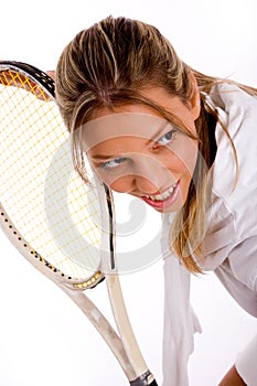 Front view of young tennis player with racket