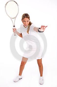 Front view of young tennis player ready to play