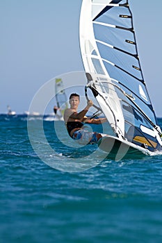 Front view of young windsurfer