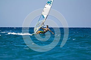 Front view of young windsurfer
