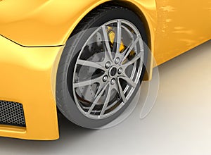 Front wheel of a bright yellow car