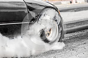 Front wheel drive drag racing car at start line