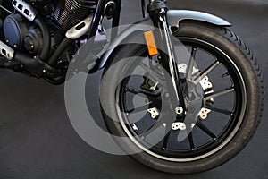 The front wheel of a motorcycle.