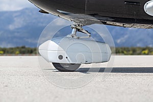 Front wheel view of a small airplane