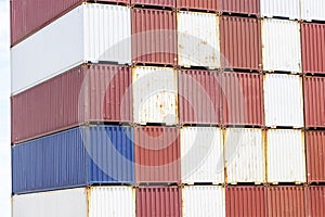 Large piles of containers are placed on container yard waiting to be shipped out