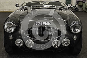 Frontal view of a Austin Healey 100F old car. Switzerland