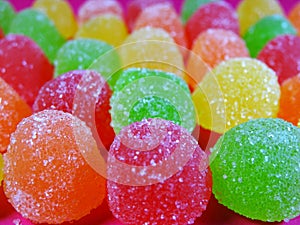 Gummies candy on a ondulated pattern closeup pattern