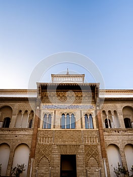 The frontal view of the Royal Palace in the Real Alcazar de Seville, from the Patio de la Monteria photo