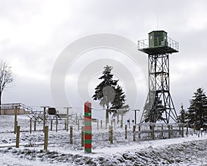 On a frontier: barbed wire, watchtower