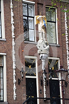 Fronts of Dutch houses - Boats tour through the canals in the Grachtengordel-West area of Amsterdam, Holland, Netherlands