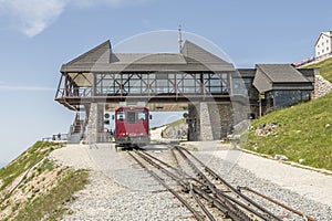 Frontview of the Mountain cog railway station from the Schafbergbahn with the cogway in front. Schafberg.