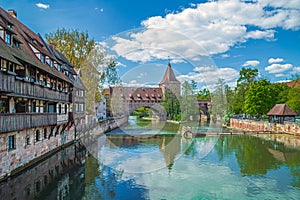 Fronveste bridge through Pegnitz river and Schlayerturm tower from 1422. Nuremberg, Bavaria, Germany