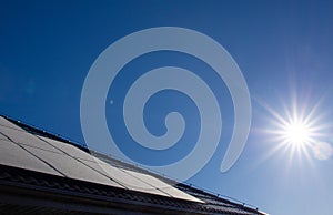 Frost covering solar panels on sunny day