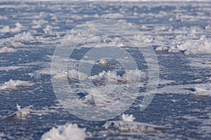 Frost flowers on frozen lake