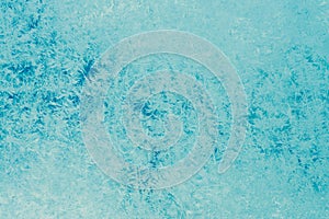 Frost pattern on glass background texture