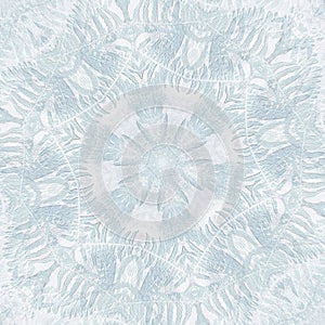 Frost on the glass. Geometric shape like fractal in white and blue tones. Winter background.