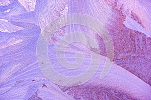 Frost patterns on window glass in winter. Frosted Glass Texture. Blue and purple