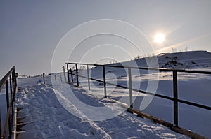 Frost and sun wonderful day , winter in Russia , spring, sunset , above the horizon