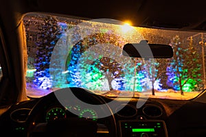 frosted car glass. snow covered car windshield.