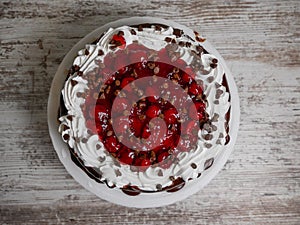 Frosted chocolate cherry decorated cake