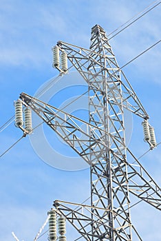 Frosted electricity pylon detail insulator on sunny winters day