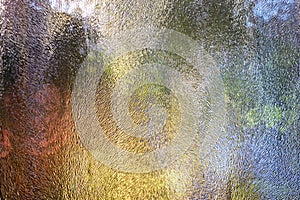 Frosted glass texture. Colorful lights background