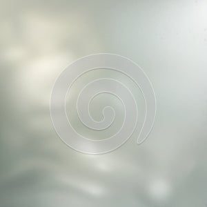 Frosted glass with a translucent appearance, diffusing light for privacy. The surface texture is smooth