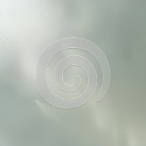 Frosted glass with a translucent appearance, diffusing light for privacy. The surface texture is smooth