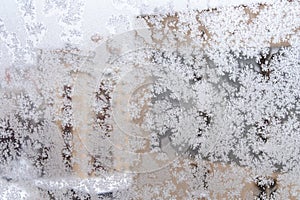 Frosted home window and view of apartment houses